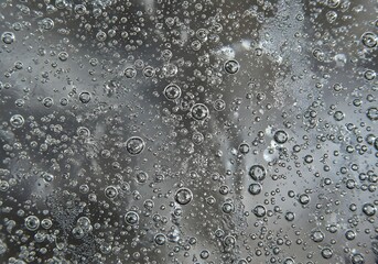 Fototapeta premium Abstract Close-Up of Bubbles in Transparent Liquid, Air, Texture, Water, Background.