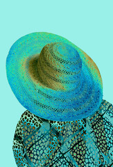 Large colorful straw hat indicates bright colors belong in the spring & summer.  Fashion sense...