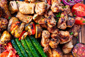 Grilled meat and vegetables feast at a summer barbecue gathering