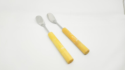 Mini spatula isolated on white background for scooping apem and pukis cakes