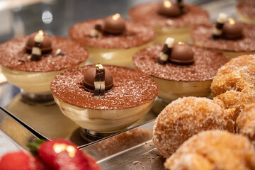 Triple chocolate Italian dessert treat with ball of sweet cocoa on top