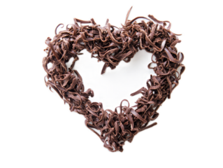 Heart shaped from chocolate shavings curled delicately on white background