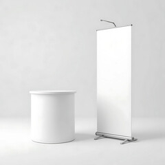 A blank white retractable banner stand and a cylindrical white table sit side-by-side on a white background. Ideal for trade show or event mockups.