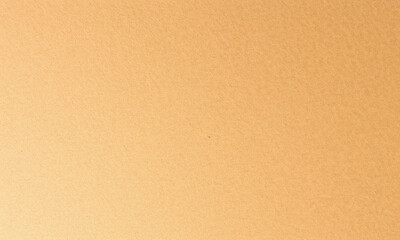 smooth, textured surface of kraft paper in warm, golden hue, perfect for various crafting and artistic projects. This versatile material adds natural touch to any creation