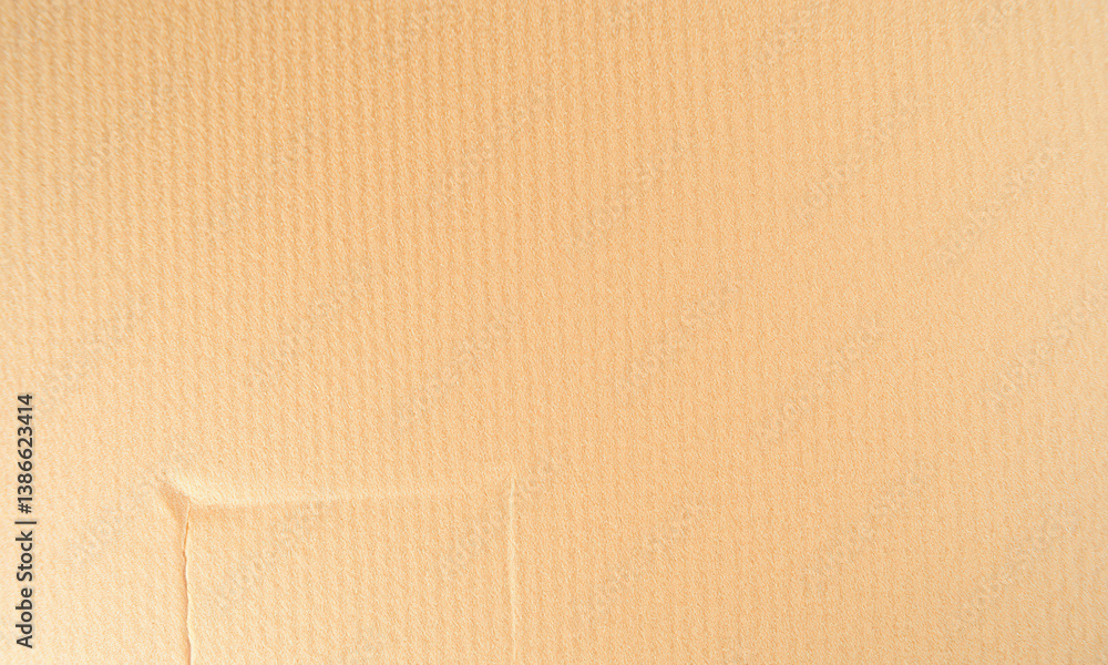 Poster close up view of textured kraft paper showcasing its natural fibers and warm beige color, perfect fo