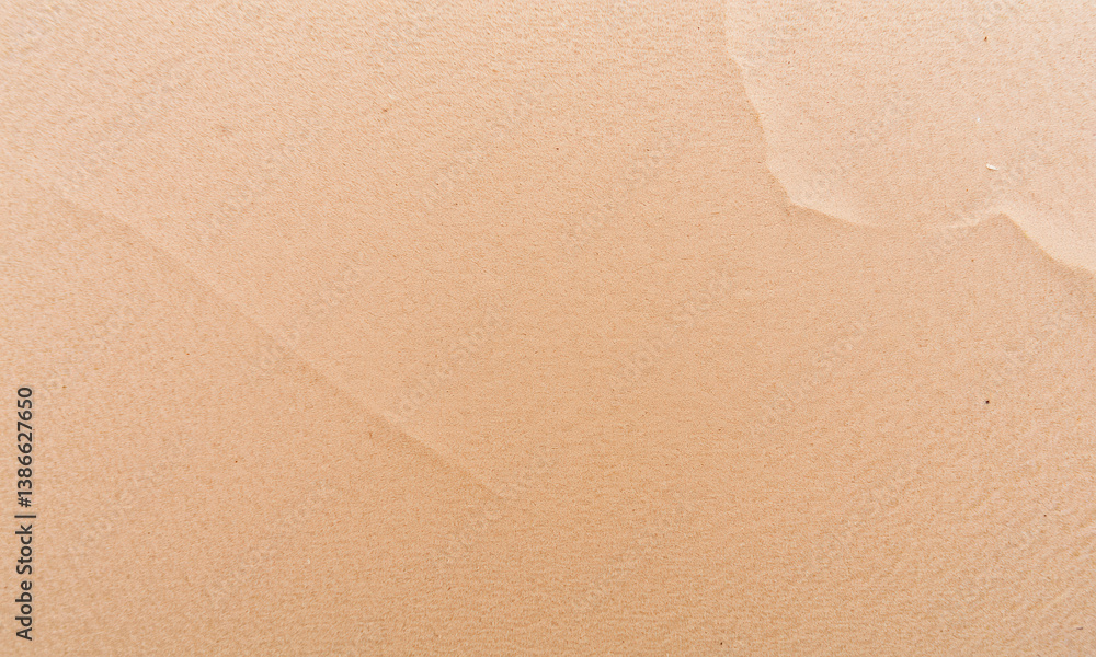 Aufkleber close up view of textured kraft paper showcasing its natural beige color and subtle patterns, evokin