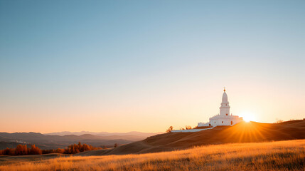 Obraz premium White Building on Hilltop at Sunset