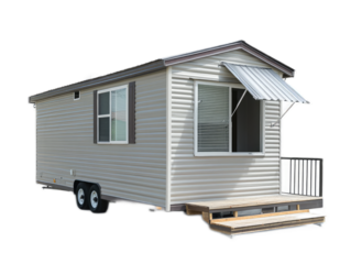 Mobile trailer home with aluminum siding, awning window, and small porch addition, isolated on white background