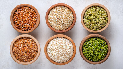 Healthy grains and legumes in wooden bowls create vibrant display of nutrition