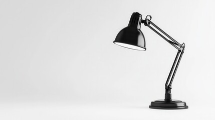 Black desk lamp on white background.