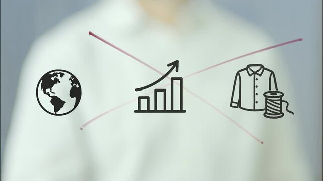 Businessman drawing a cross on a transparent screen over icons of clothes and spool of thread, a growing graph, and planet earth, symbolizing the concept of tariffs on imported clothes