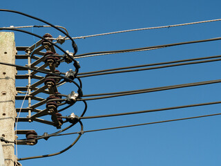 Electric poles and high-voltage signaling equipment
