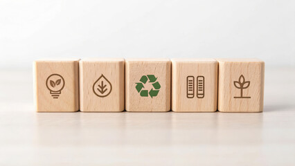 Conceptual image for World Environment Day. Eco icons on wooden blocks showing sustainability and recycling concept.