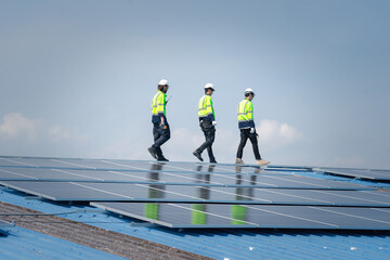 Engineer team installs solar cells check installation solar cell on the roof Sustainable energy industry concept Renewable energy solutions for climate change..