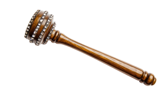 A close-up of a polished wooden judge gavel resting on its soundboard with fine grain details, isolated against a pure white background