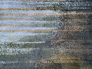 Graphic background in abstract illustrated cloud, brushed, and wavy pattern. Painted in blue,...