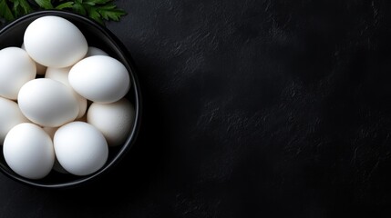 Fresh Eggs in a Bowl on Dark Surface
