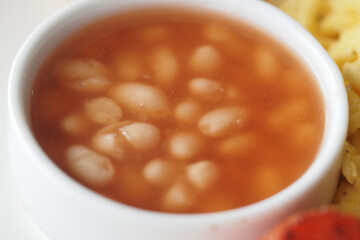 Delicious bowl of white beans served with savory rice