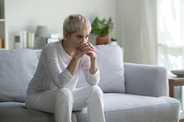 An elderly Asian woman is mentally ill, sad and unhappy. Asian woman, depressed, lonely and...
