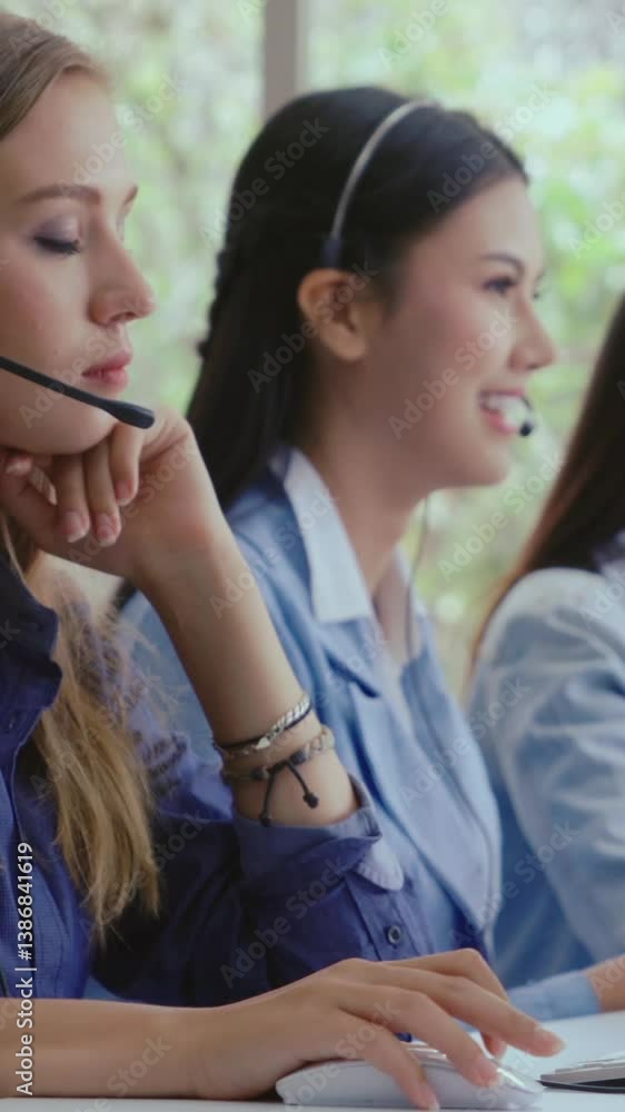 Aufkleber customer support agent or call center with headset works on desktop computer while supporting the cu