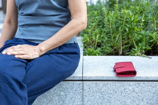 Careless old woman leaving her purse and money unattended
