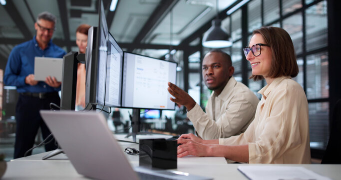 Multiracial Team Of Accountants Using Digital Electronic Invoice - Powered by Adobe