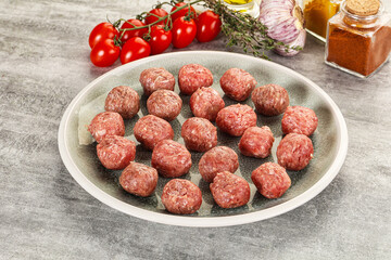 Uncooked raw beef meatball minced