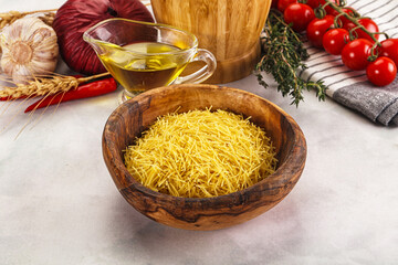 Raw dry Italian pasta Vermicelli
