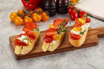 Bruschetta tapas with chorizo and tomato
