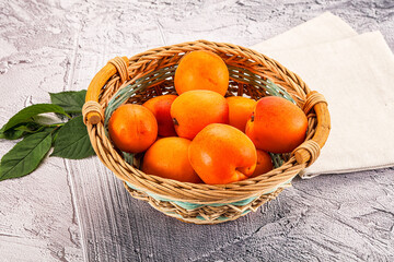 Raw ripe sweet apricots heap
