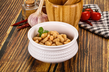 Baked white canned beans in the bowl