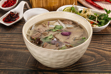 Vietnamese Pho Bo soup with beef and noodles