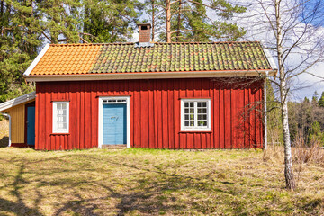 Idyllic old wooden croft at the forests edge in springtime © Lars Johansson