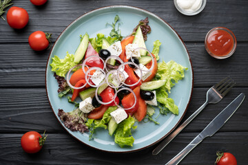 healthy vegetable salad of feta cheese, tomato, olives