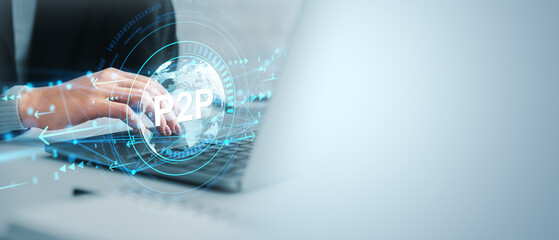 Businessperson using laptop with digital P2P symbol overlay on light background, representing peer-to-peer technology concept in office setting.