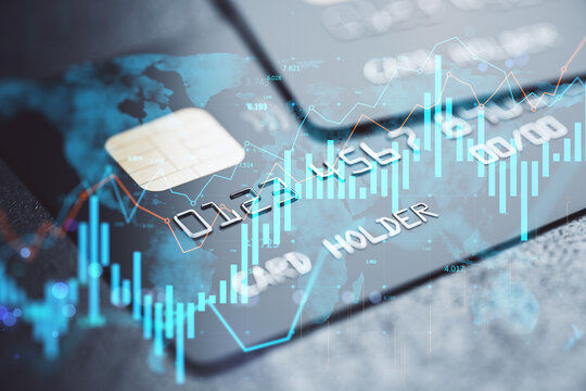 Credit card with global financial data chart overlay on abstract digital background in double exposure business technology concept style.
