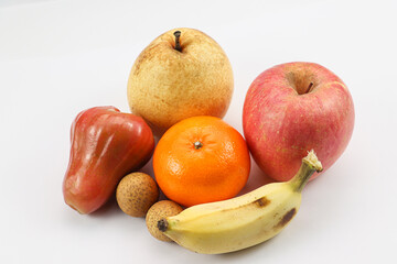 Mixed fruits arranged together in neat cluster