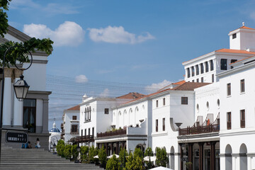 Outdoor landscape photography of white neocolonial architecture on a sunny day with no people.