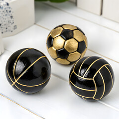 A collection of black-and-golden-basketball--soccer balls on white background