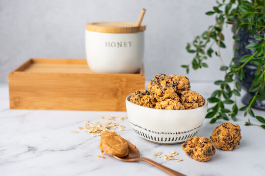 Chocolate chip Peanut Butter Protein Oat Balls in a dish on Counter