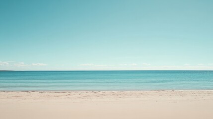Fototapeta premium Serene Coastal Landscape Calm Ocean and Sandy Beach