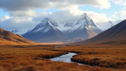 Fototapeta premium Mountains With River Running Through Meadow