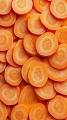 Top View of Freshly Sliced Ripe Carrots as Vibrant Background