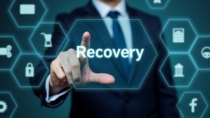 Obraz premium Businessman Pointing at Recovery Button Concept