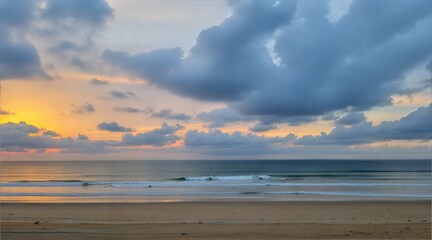Peaceful Beach Scene At Sunrise With Waves And Dramatic Cloudscape