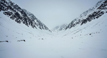Obraz premium A Remote, Uncharted Mountain Wilderness Covered in Deep Snow and Frost