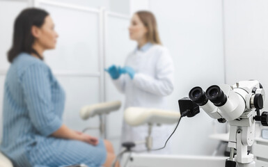 Colposcopy, examination of cervix. Colposcopy close-up over gynecological consultation of woman...