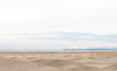 Blurry sky,cloud over sea sand beach in morning summer,Soft focus nature background by the sea with brown sand and sea water for Summer background holiday travel,sale,promotion