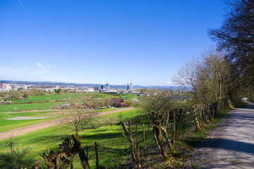 Scenic view of rural landscape of organic farm at Swiss City of Zürich on a sunny spring...