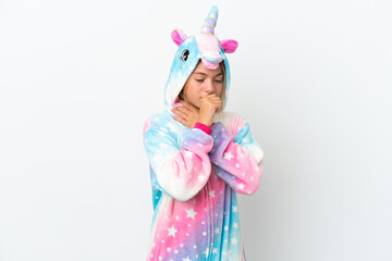 Little girl with unicorn pajamas isolated on white background is suffering with cough and feeling bad